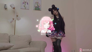 Naughty cosplay girl Megan Murkovski plays with a dildo.