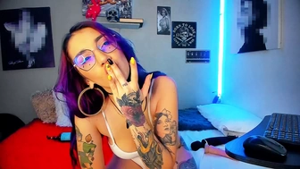 Beautiful nerdy Colombian with purple hair gets out of control in her webcam show spitting on her big tits