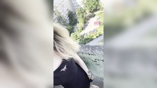 Squirting on a public balcony!