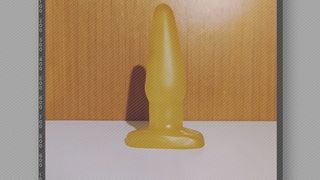 Ligia CyberSlut latex version profit with her yellow jelly anal plug