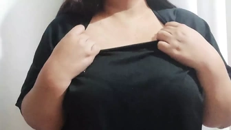 Fat girl with big tits playing with her new sex toy with nipple clamps
