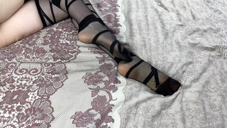 Beautiful solo in black nylon stockings from a sexy girlfriend in bed for foot fetish lovers